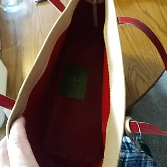Beige in color Kate Spade zippered purse - Picture 3 of 5